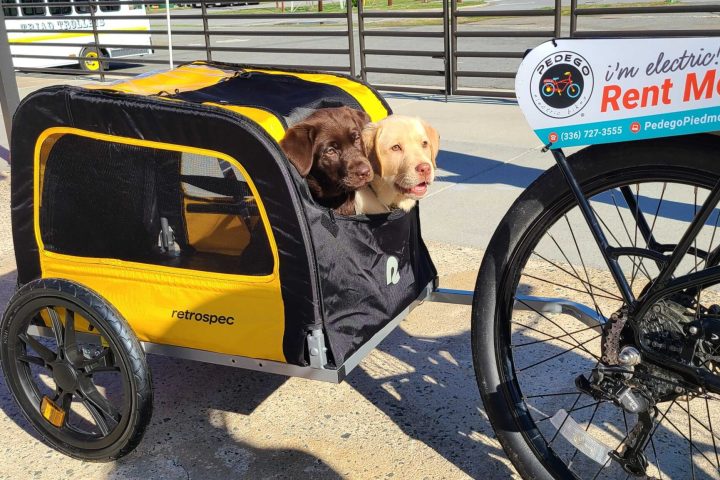 a bicycle parked on a sidewalk