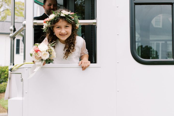 Gunnar Sizemore standing in front of a bus