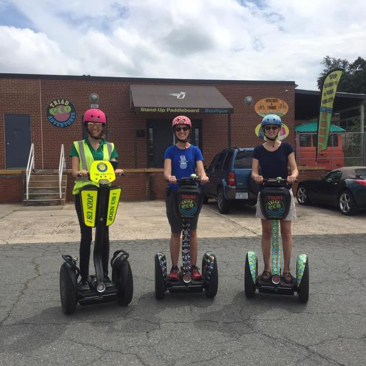 Three women on Segway PTs