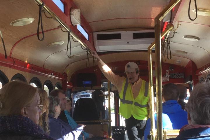 a group of people sitting at a train station