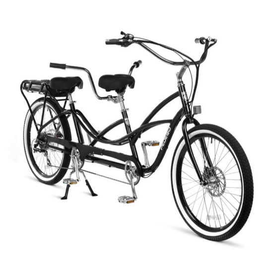 a bicycle leaning against a wall