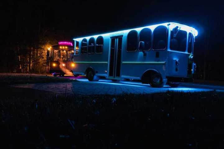 a bus is lit up at night