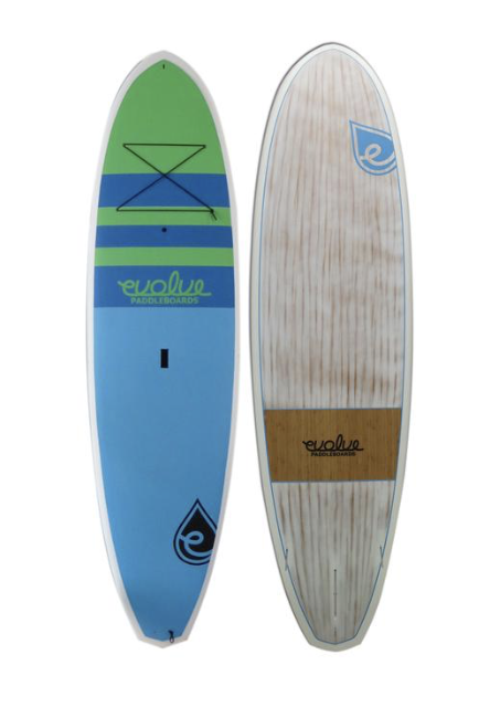 a boat sitting on top of a wooden board